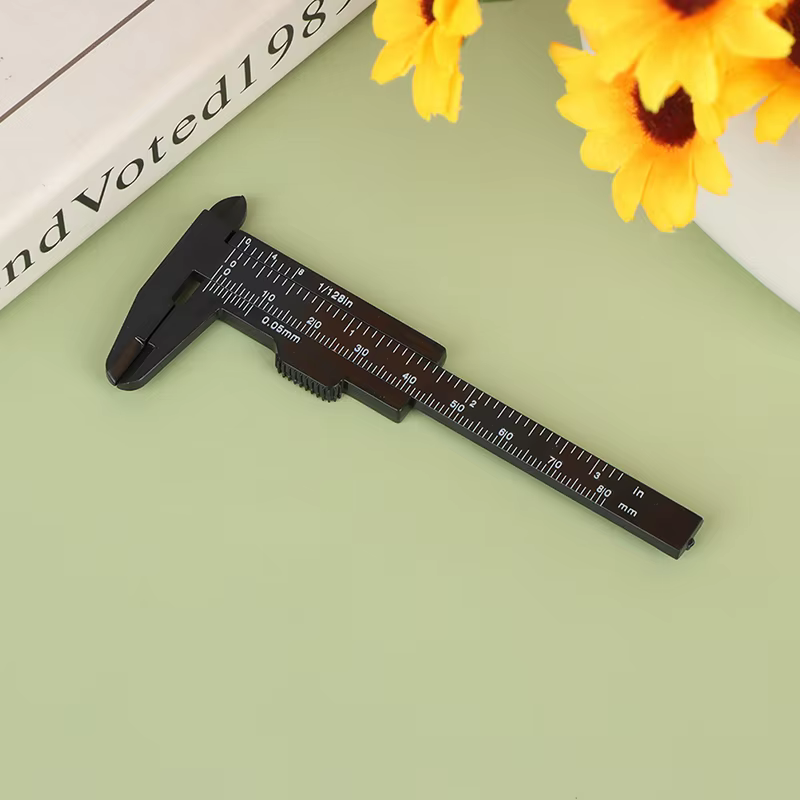 Pied à coulisse portable en plastique de 80 mm à double échelle pour la mesure des sourcils, outil d