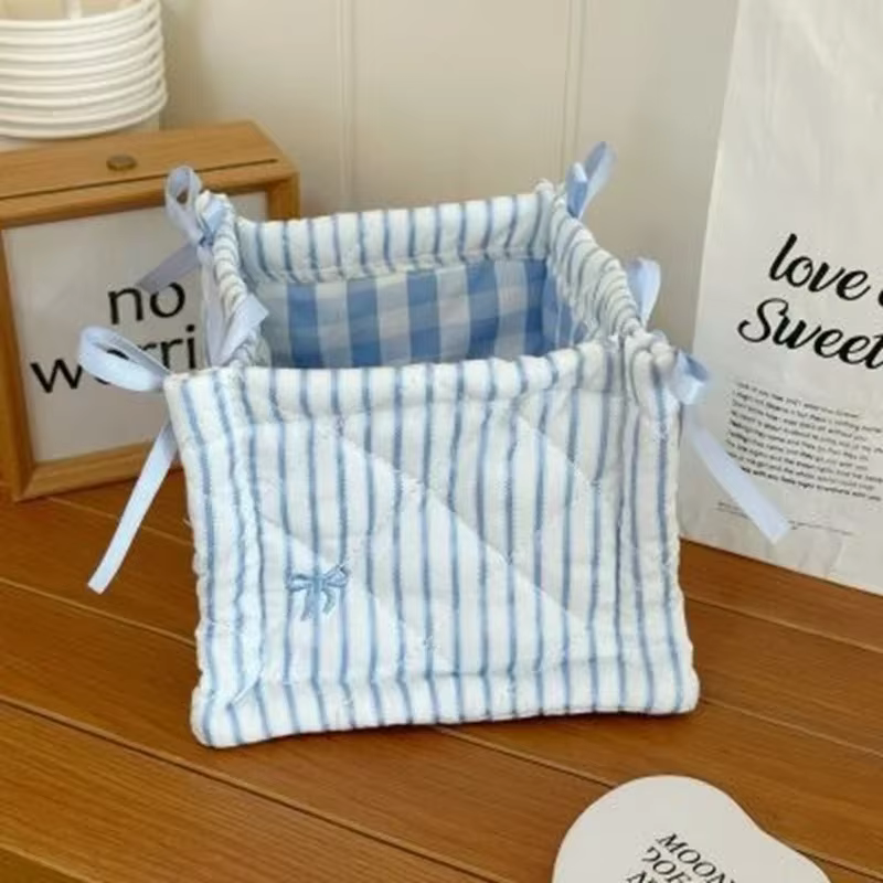 Panier de rangement matelassé pliable en tissu avec jolie décoration en nœud, boîte de rangement de 