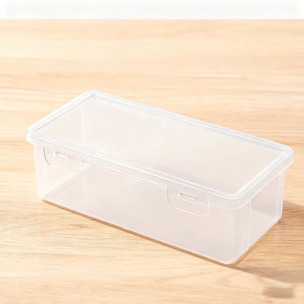 La boîte de rangement en plastique blanc est étanche, légère et durable, et est un outil de rangemen