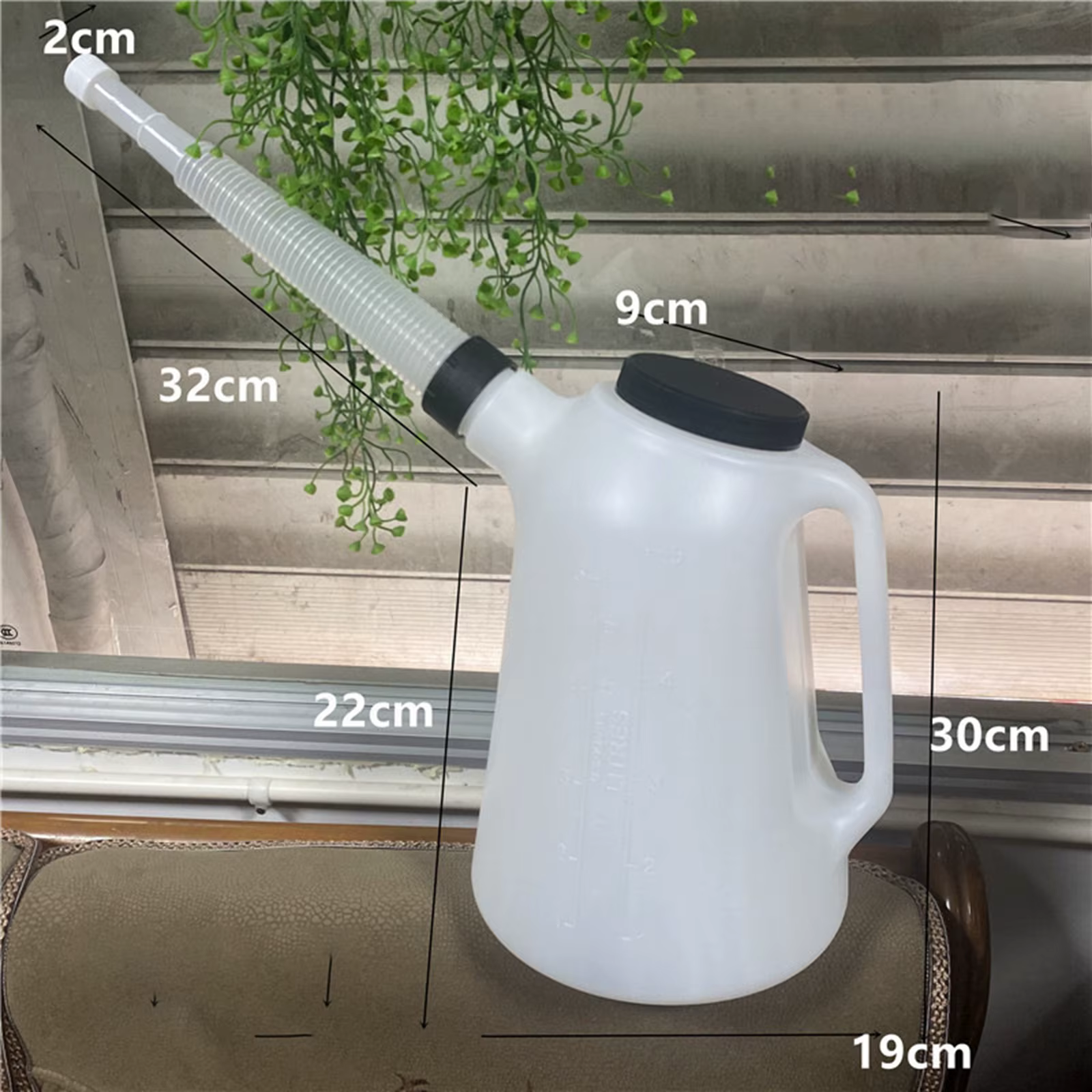 Pichet de mesure d'huile avec bec