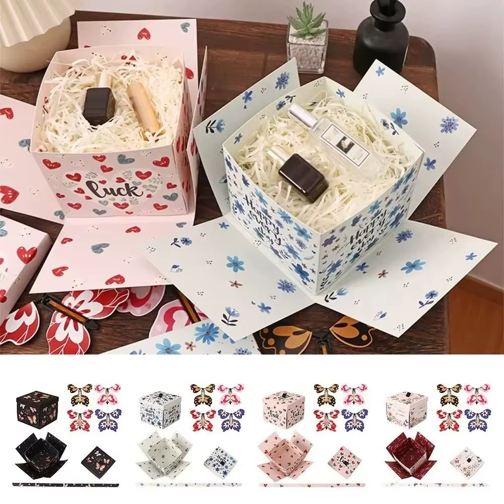 Boîte cadeau papillon multicolore avec mécanisme à remonter