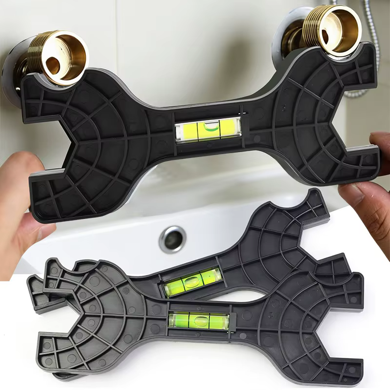 Clé à double tête avec niveau intégré pour l'installation de robinets de douche