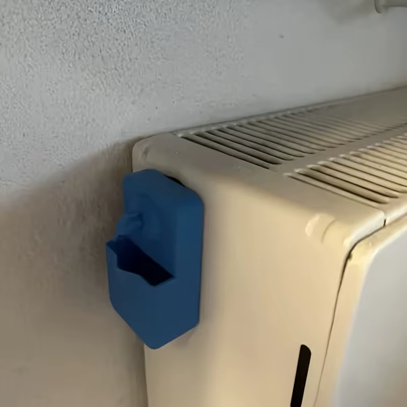 Clé de purge de radiateur avec boîte de récupération d'eau anti-débordement