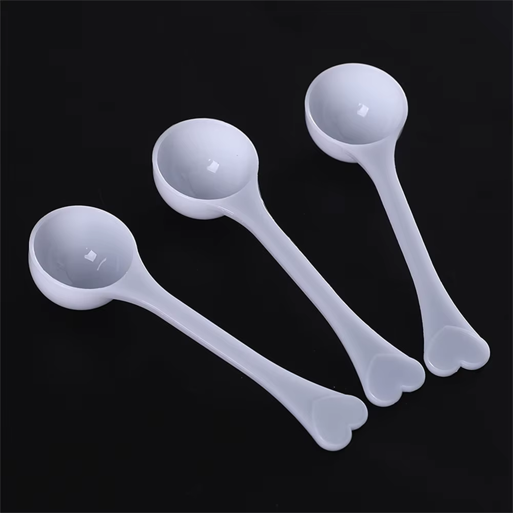 Cuillère doseuse en plastique pour café