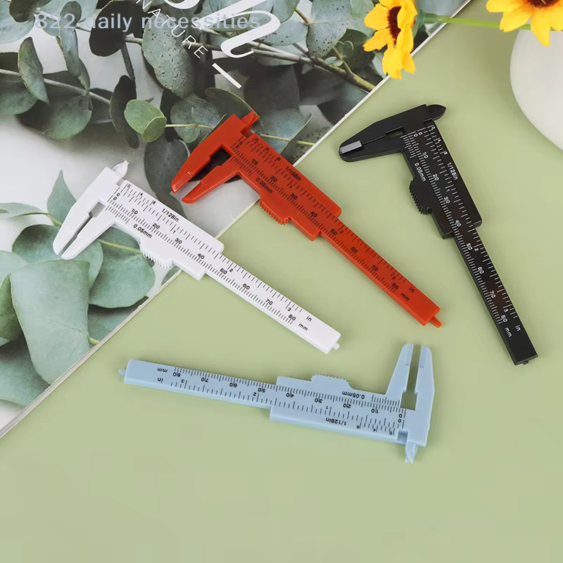 Pied à coulisse portable en plastique de 80 mm à double échelle pour la mesure des sourcils
