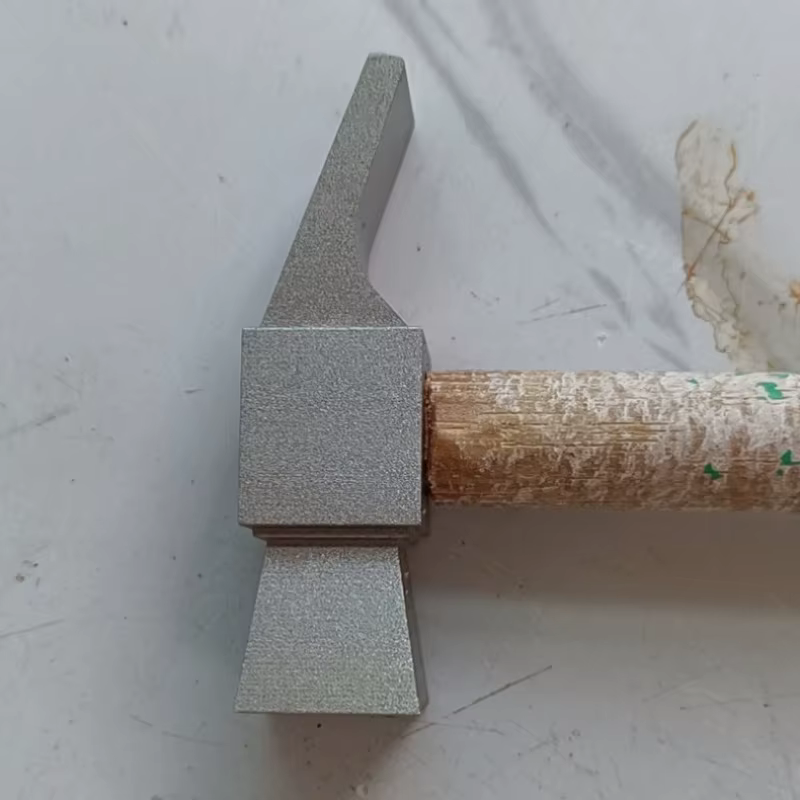 Tête de marteau de charpentier