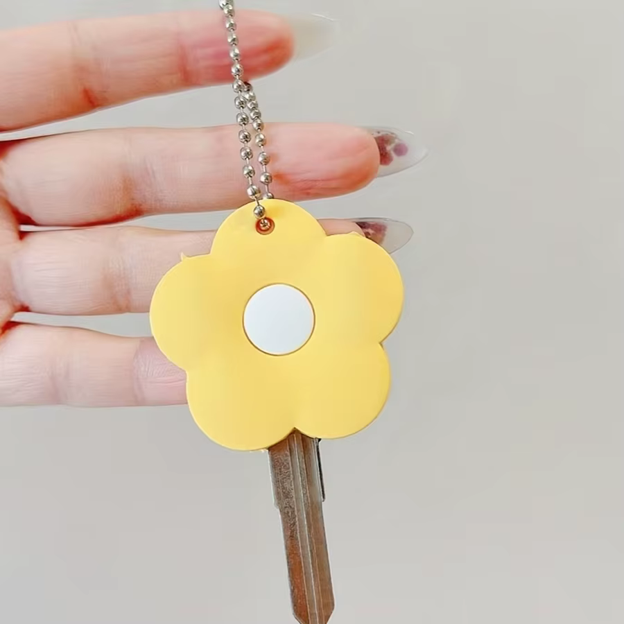 Ensemble de 2 capuchons de clés à fleurs de dessin animé mignons, couvre-clés flexibles, autocollants d'identification de clés, étiquettes de clés de porte faciles à identifier, les couleurs sont aléa