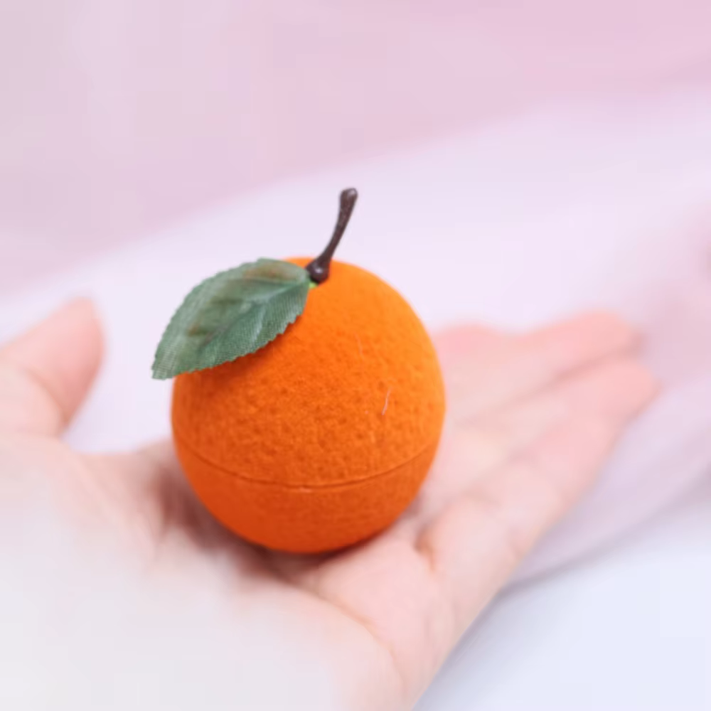 Boîte à bagues orange anti-poussière