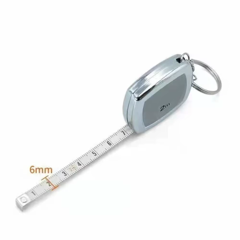 Petit ruban à mesurer en acier avec porte-clés