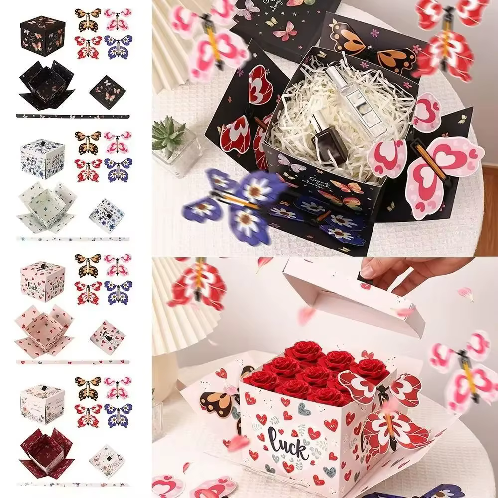 Boîte cadeau papillon multicolore avec mécanisme à remonter
