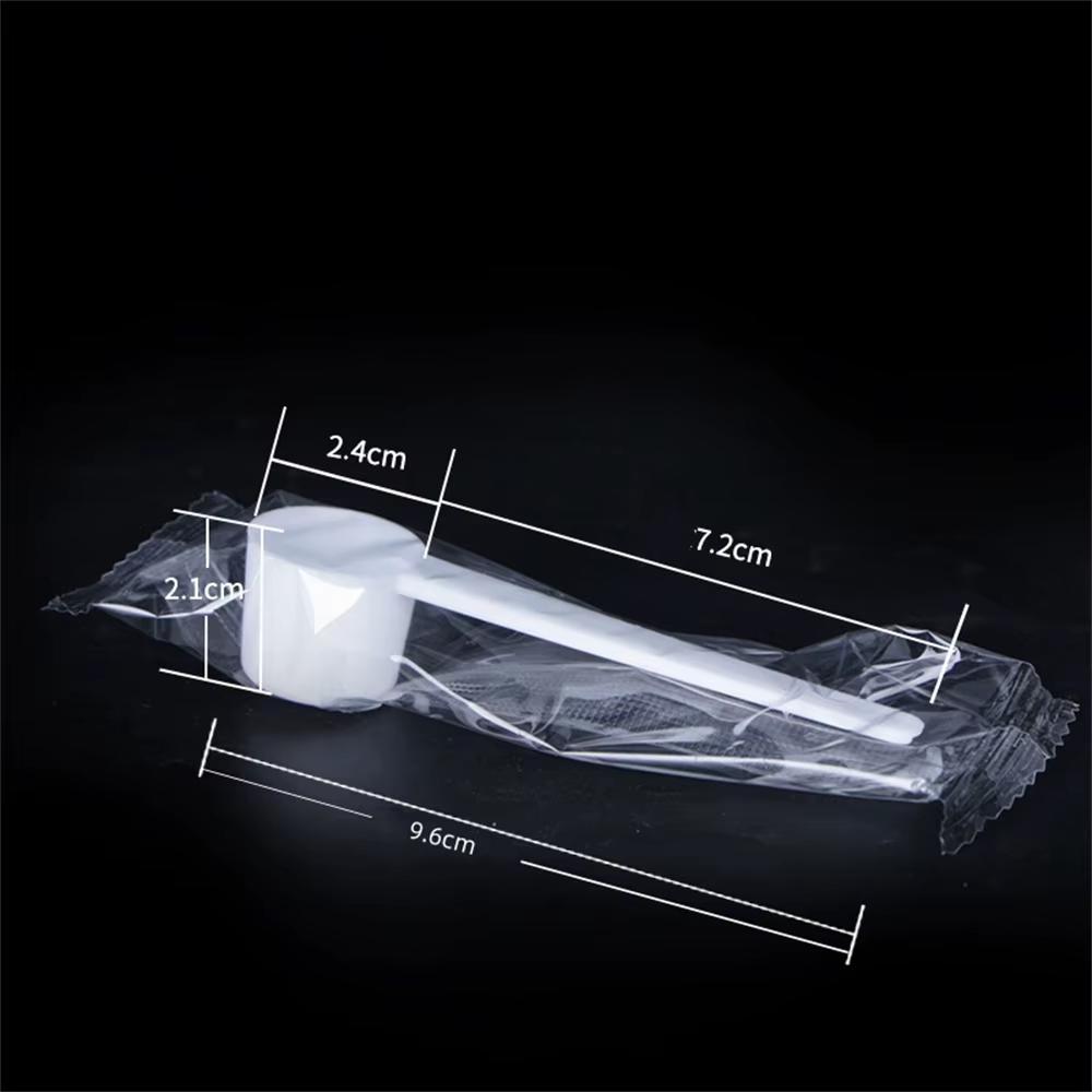 Cuillère doseuse en plastique pour café