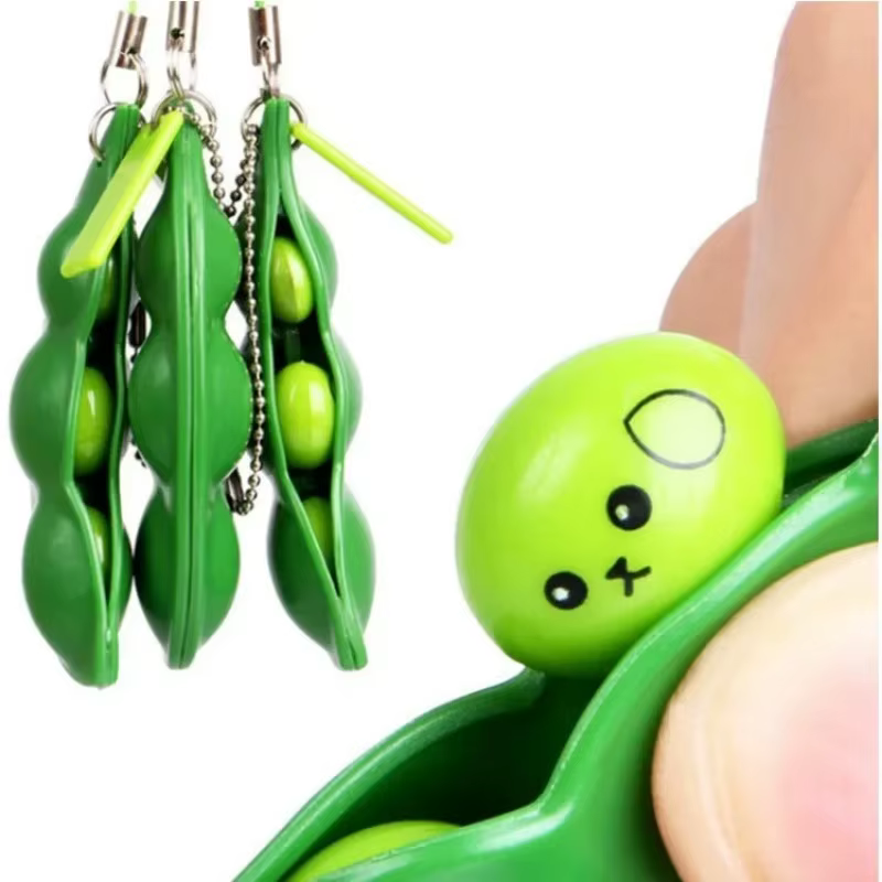 Porte-clés anti-stress tactile en forme de pois edamame à presser