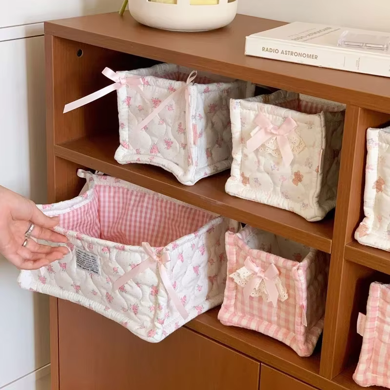 Panier de rangement matelassé pliable en tissu avec jolie décoration en nœud