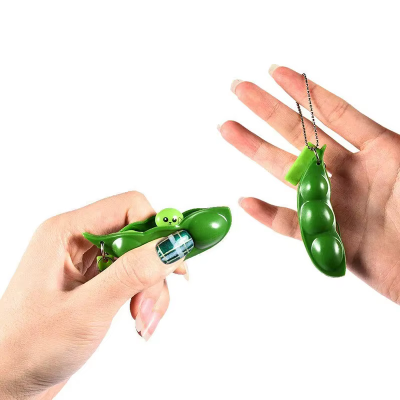 Porte-clés anti-stress tactile en forme de pois edamame à presser