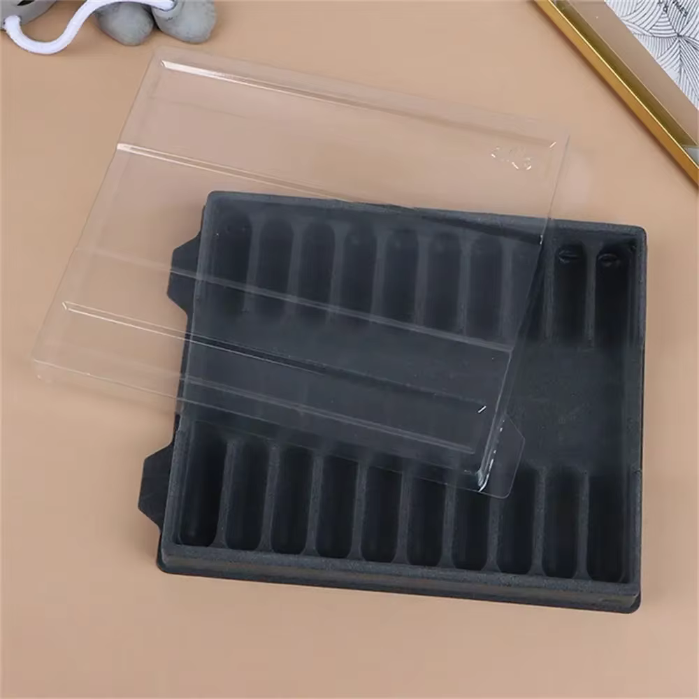 Boîte à stylos à plume transparente