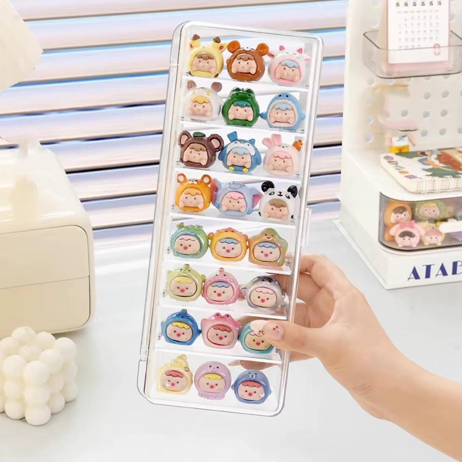 Une boîte de rangement multicouche anti-poussière avec une jolie petite vitrine