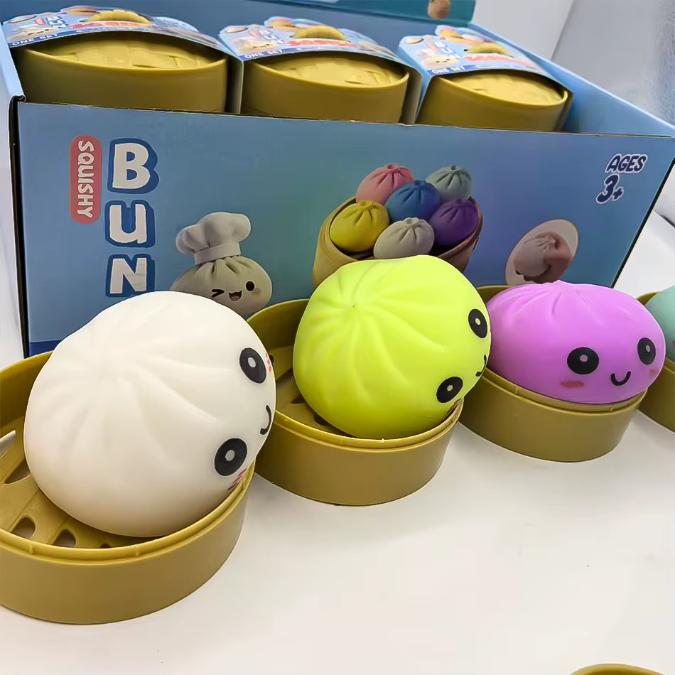 Boîte mystère : Jouet anti-stress coloré en forme de dumpling simulé