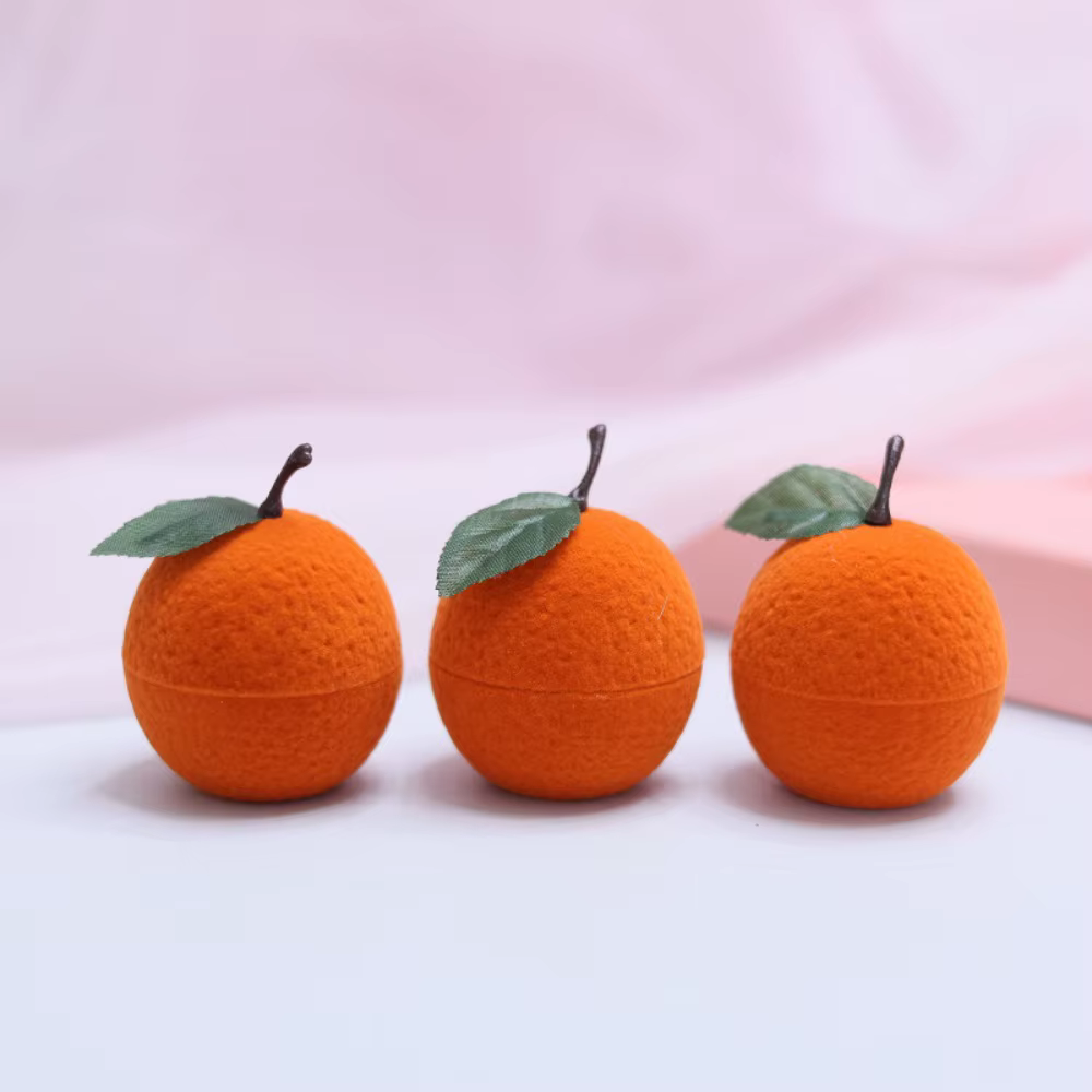 Boîte à bagues orange anti-poussière