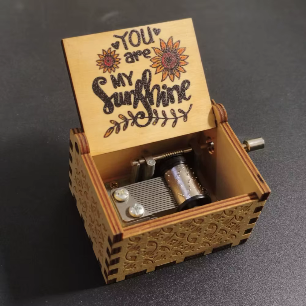 Boîte à musique miniature en bois à manivelle
