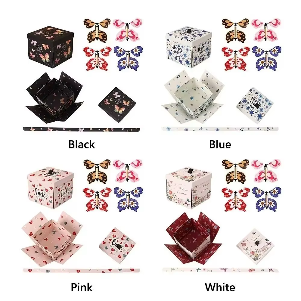 Boîte cadeau papillon multicolore avec mécanisme à remonter
