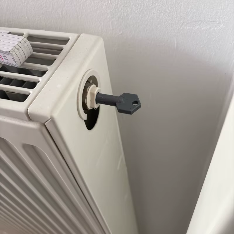 Clé de purge de radiateur avec boîte de collecte d'eau anti-débordement