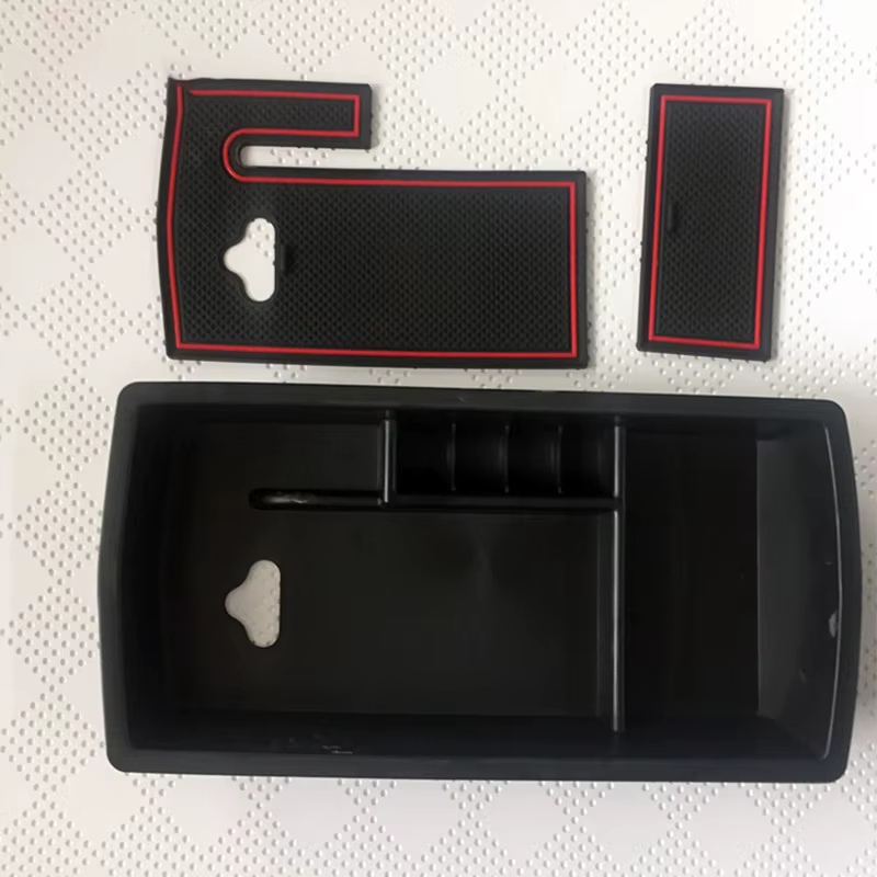 Boîte de rangement pour accoudoir central