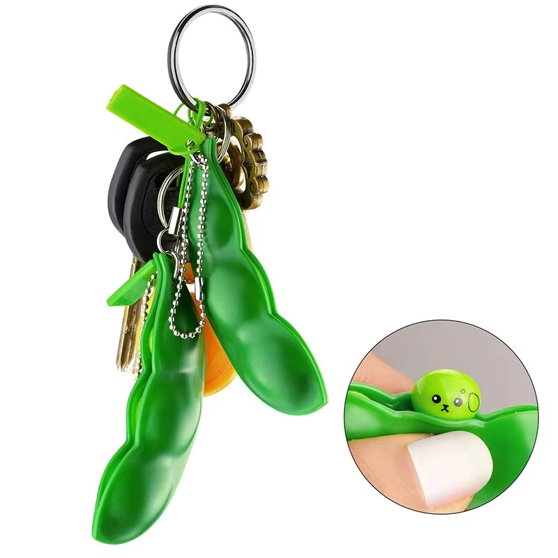 Porte-clés anti-stress tactile en forme de pois edamame à presser