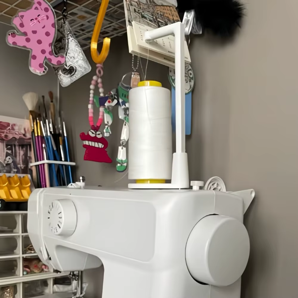 Support de fil supérieur pour machine à coudre