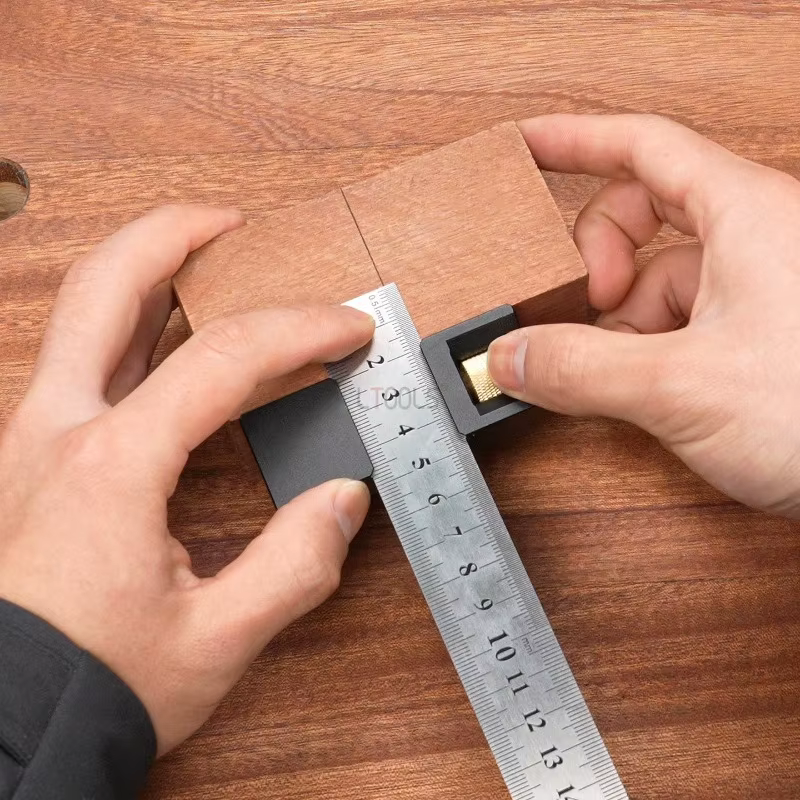 Règle de marquage et de positionnement avec bloc coulissant fixe